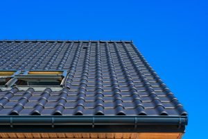 compressed-vertical-low-angle-closeup-shot-black-roof-building